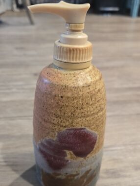 Stoneware Soap Pump Dispenser in Speckled Tan with Burgundy Detail